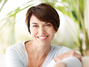 Smiling woman. Link to Gifts of Appreciated Securities Smiling woman. Link to Gifts of Appreciated Securities