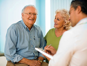 Doctor with patients. Link to Gifts That Protect Your Assets